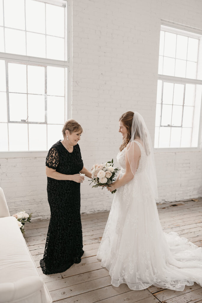 mother and bride first look