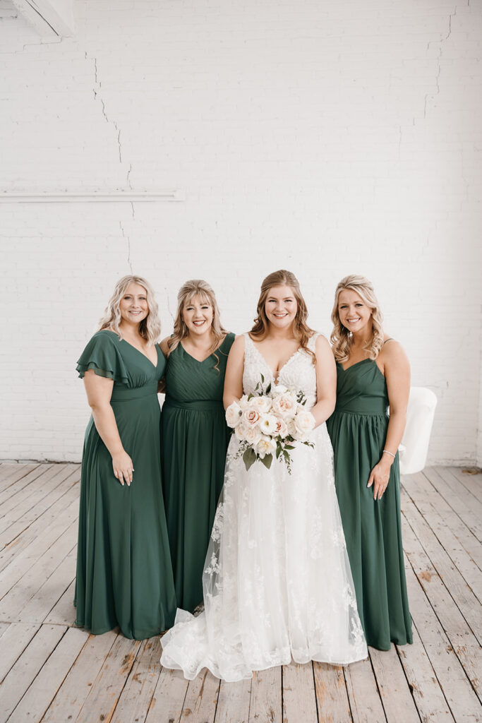 bride and bridesmaids in the bridal suite