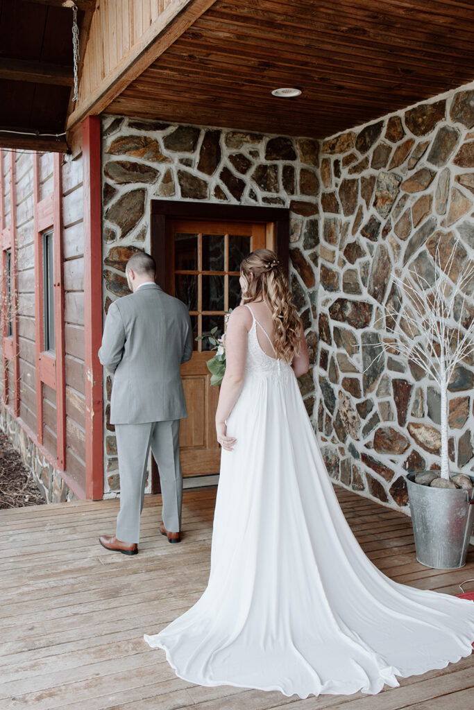 bride and groom first look during their Airbnb small wedding