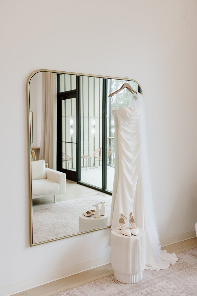 Wedding dress hanging in a Nature Link getting-ready suite