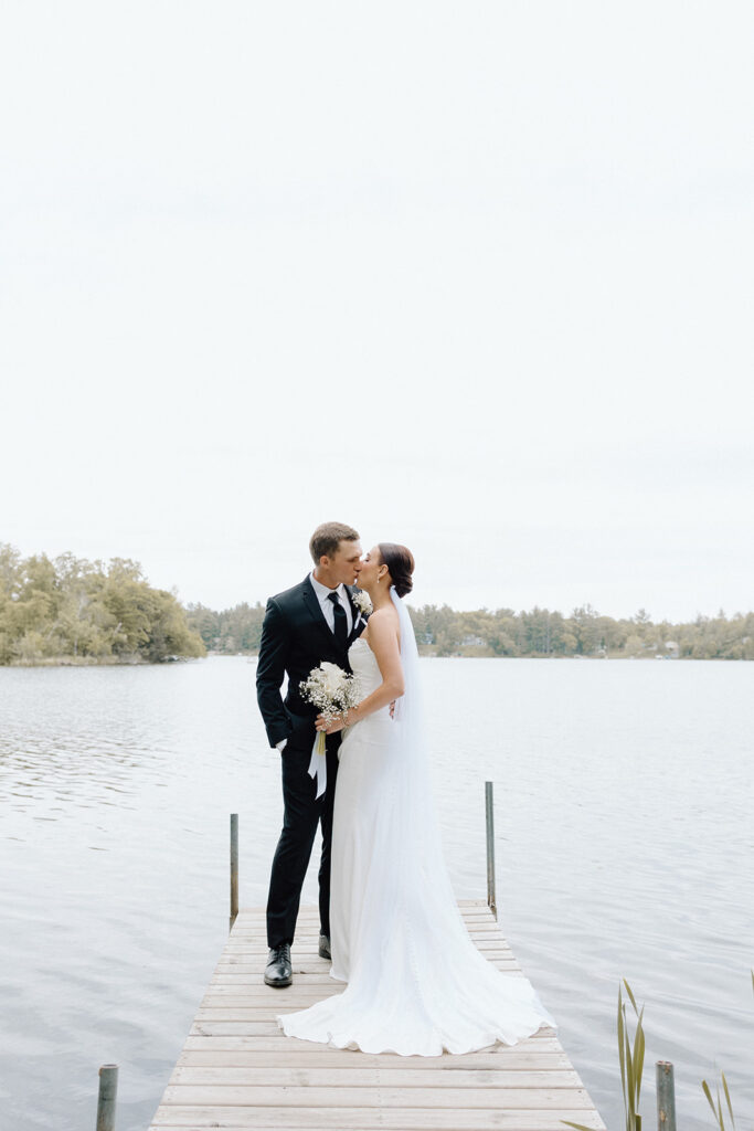 Bride and groom on the lake in Minnesota