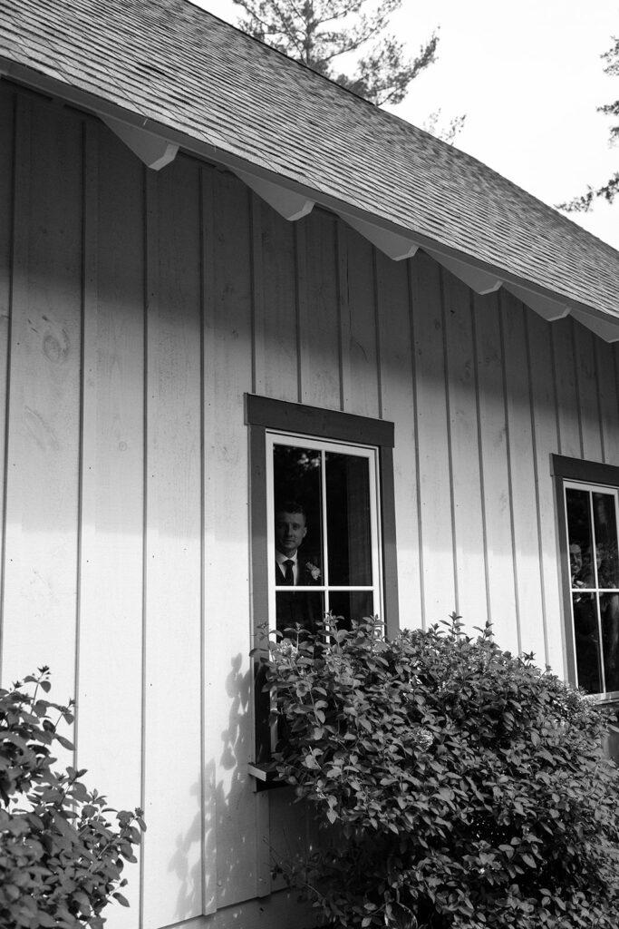 Friends and family peeking out of the window to see the first look