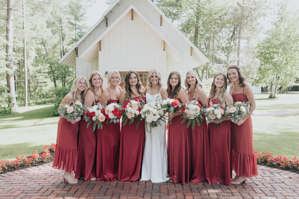 bridesmaids standing in front of the Grand View Lodge chapel