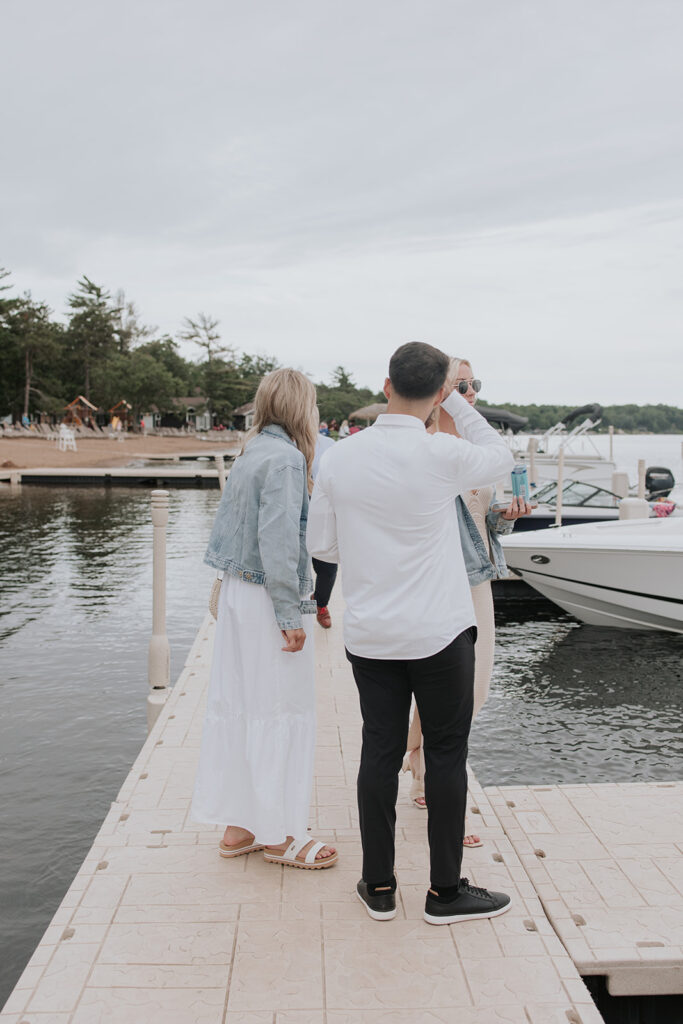 Bride and groom waiting for the boat