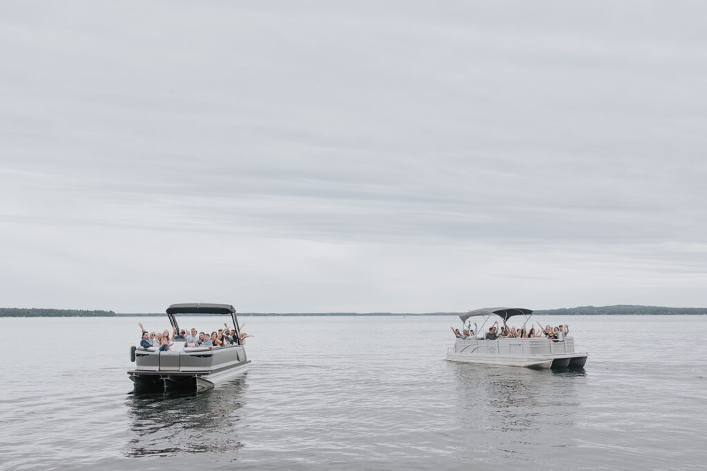 2 pontoon boats riding out onto Gull lake