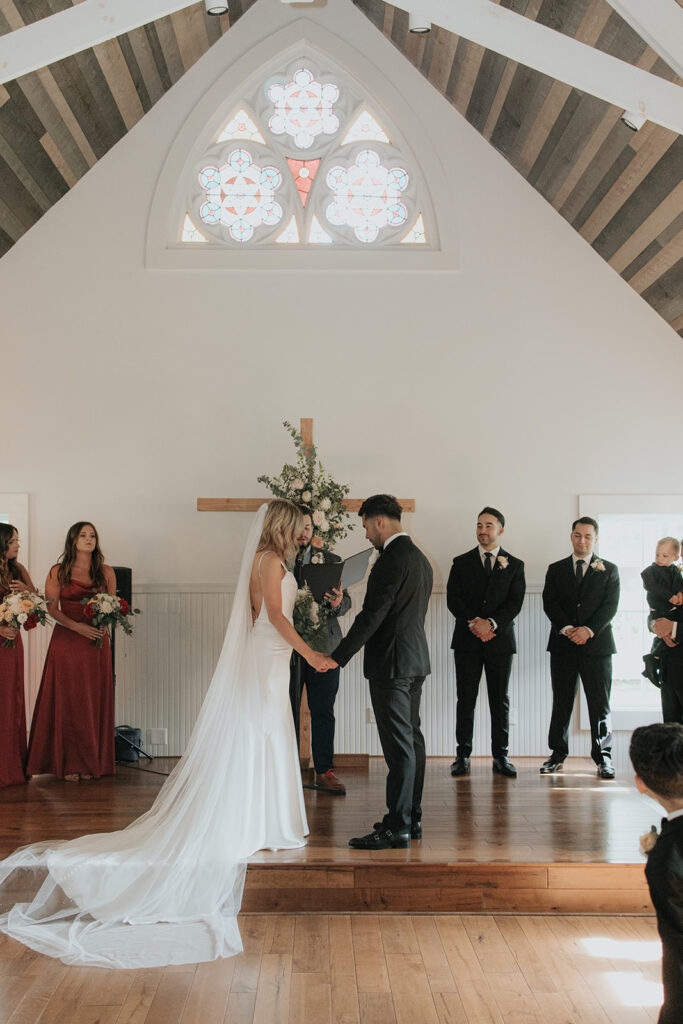 Bride at groom at the chapel altar