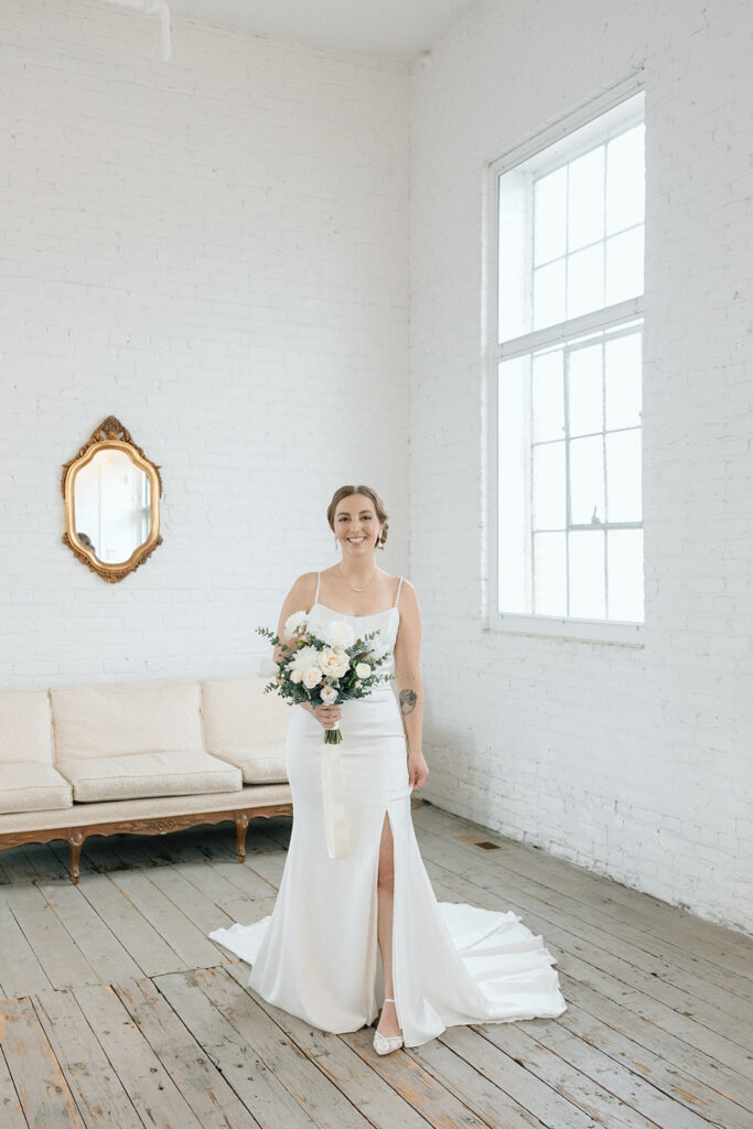 Bride posing in the brial suite
