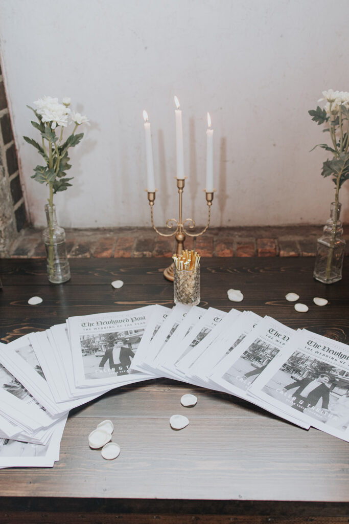 Wedding newspapers spread out on a table