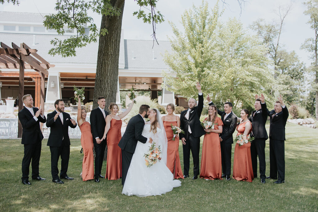 Bride and groom with their wedding party