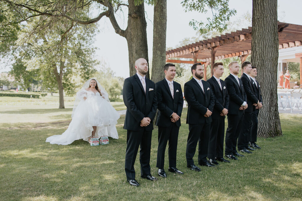 Bride ices the groomsmen