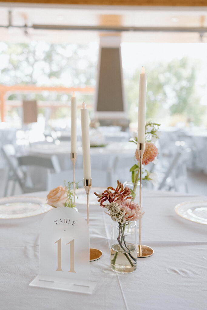 Clean and simple wedding table decor with pastel florals