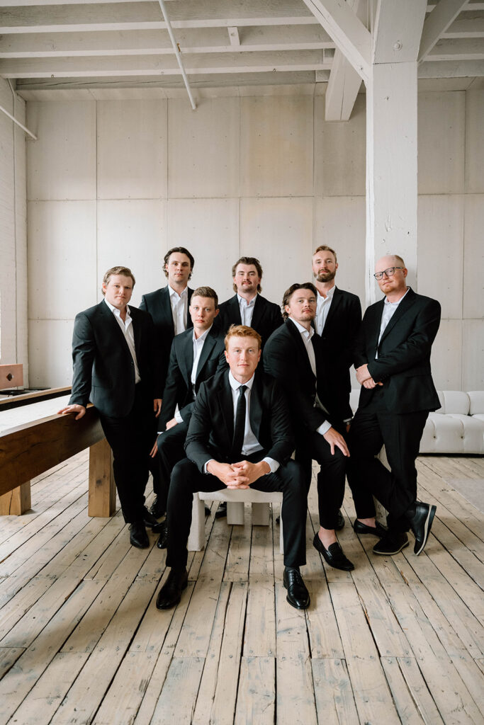 Groomsmen posing for portraits