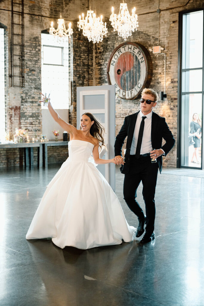 Bride and groom sharing a joyful first dance at The Northern Pacific Center in Brainerd, Minnesota

