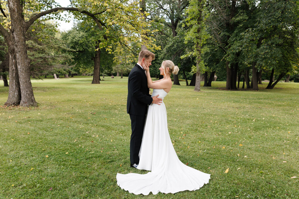 Bride and groom sharing their first look at a private estate wedding in North Dakota
