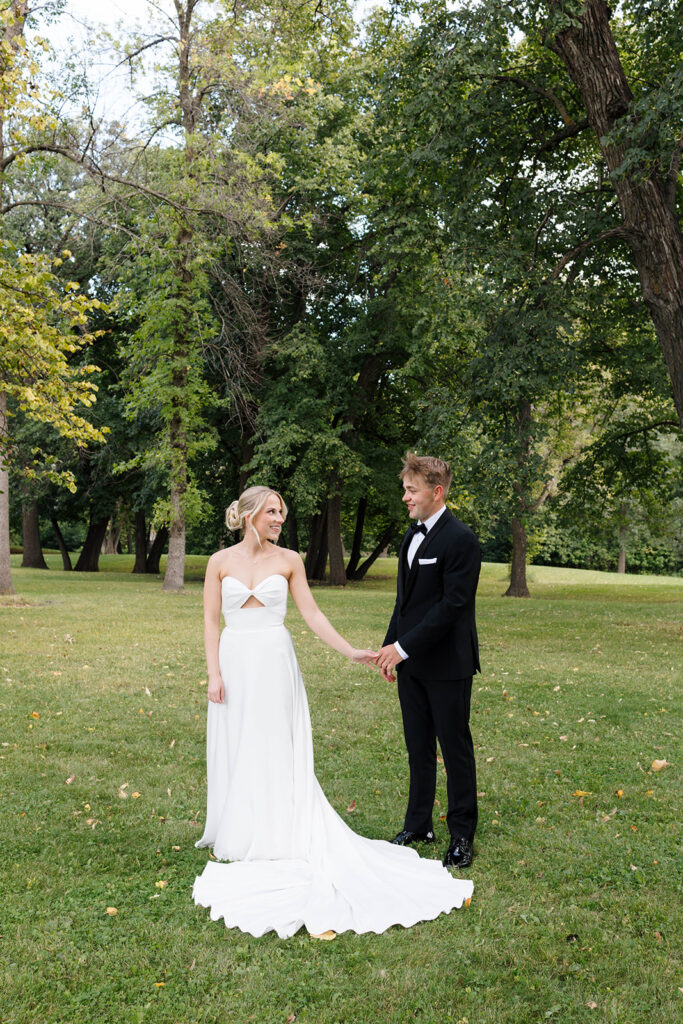 Bride and groom sharing their first look at a private estate wedding in North Dakota
