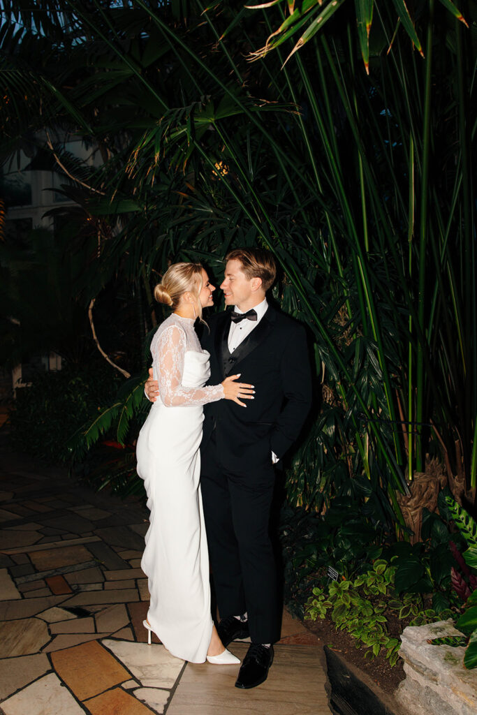 Flash photo highlighting the couple’s style during cocktail hour.
