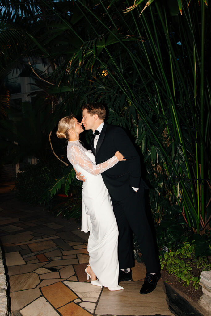 Flash photo highlighting the couple’s style during cocktail hour.
