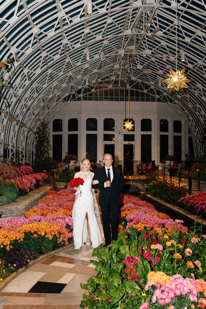 Flash photo highlighting the couple’s style during cocktail hour.
