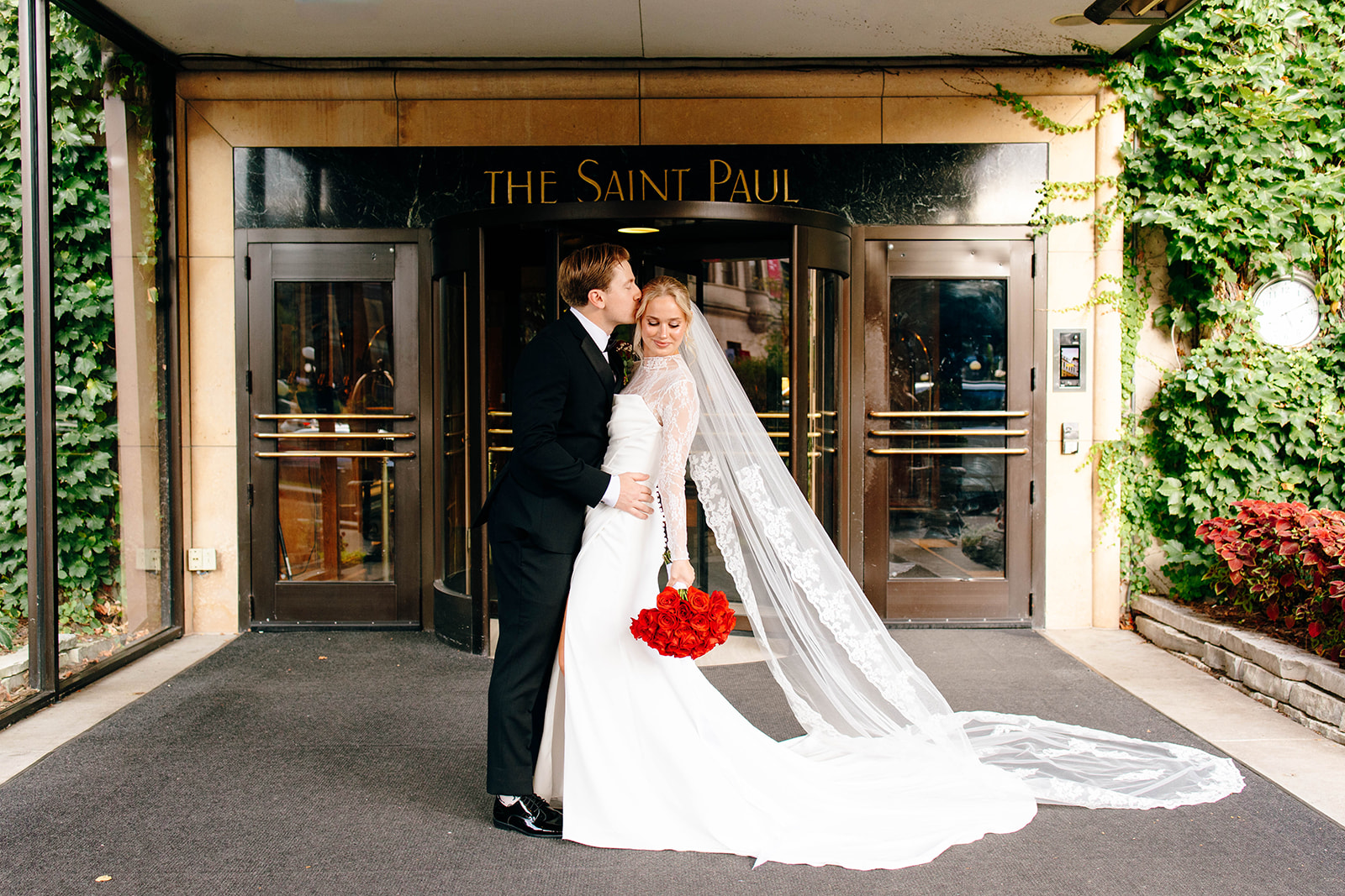Couple photographed in a classic city setting during a st paul hotel wedding day