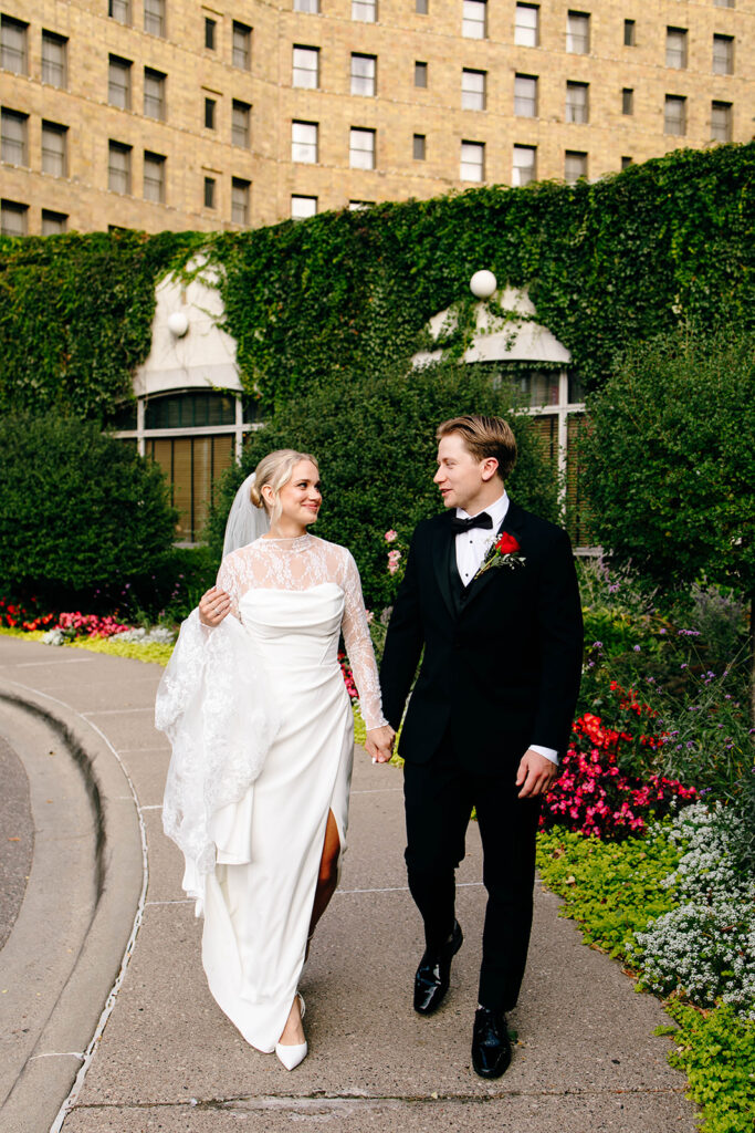 Candid photo taken during a cozy ceremony at a botanical space.
