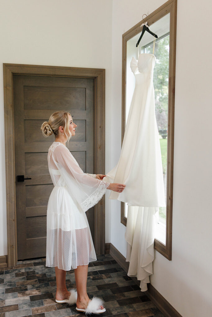 Bride getting ready with hair and makeup by Avant Hair and Skin Care Studio
