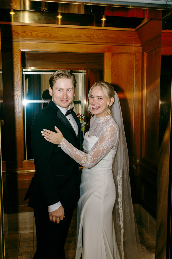 Couple photographed in a classic city setting during a st paul hotel wedding day

