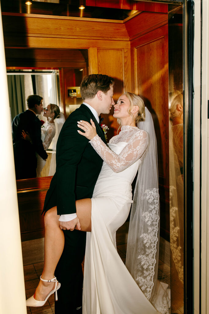 Couple photographed in a classic city setting during a st paul hotel wedding day
