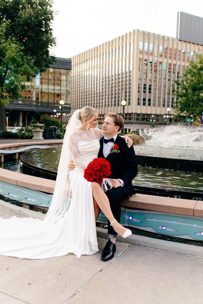 Couple photographed in a classic city setting during a st paul hotel wedding day
