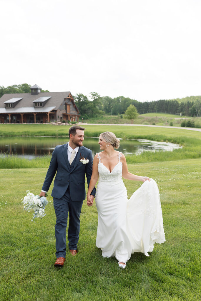Bride and groom sharing a candid moment during their wedding day.

