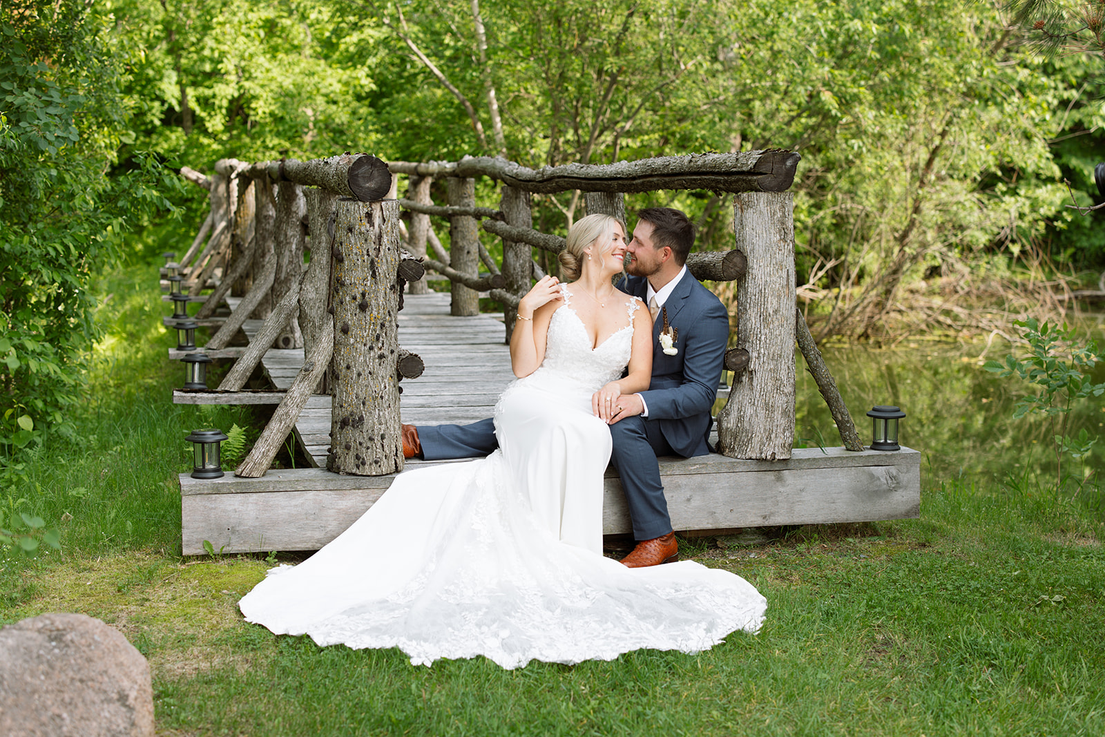 Bride and groom sharing a candid moment during their wedding day.