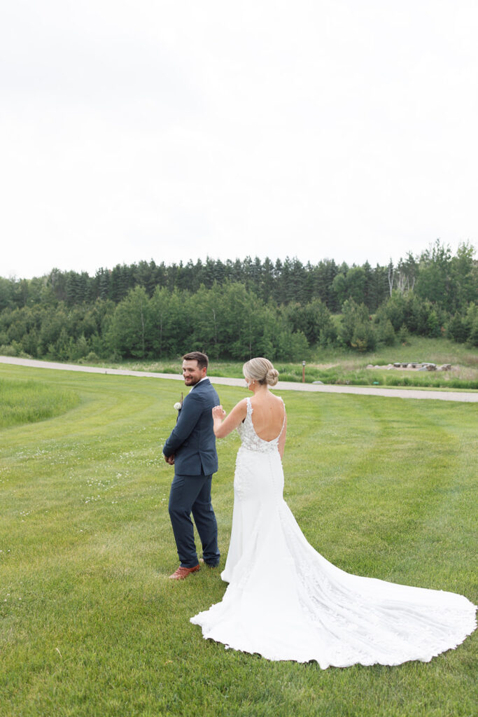 Bride and groom sharing a candid moment during their wedding day.
