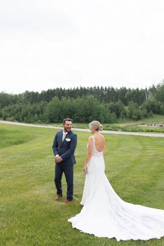 Bride and groom sharing a candid moment during their wedding day.

