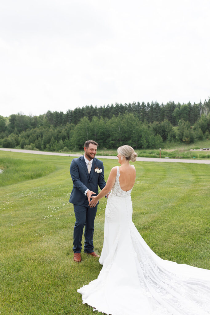 Bride and groom sharing a candid moment during their wedding day.
