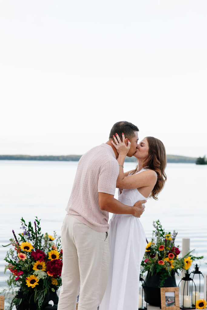 Couple standing together outdoors during a candid moment.
