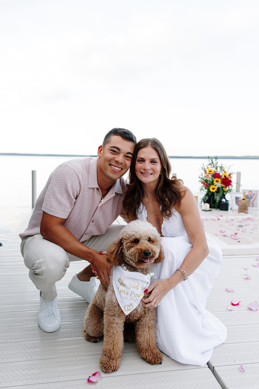 Natural light photo capturing a joyful engagement at crosslake chain.