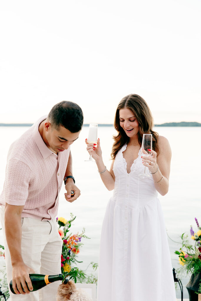 Couple standing together outdoors during a candid moment.
