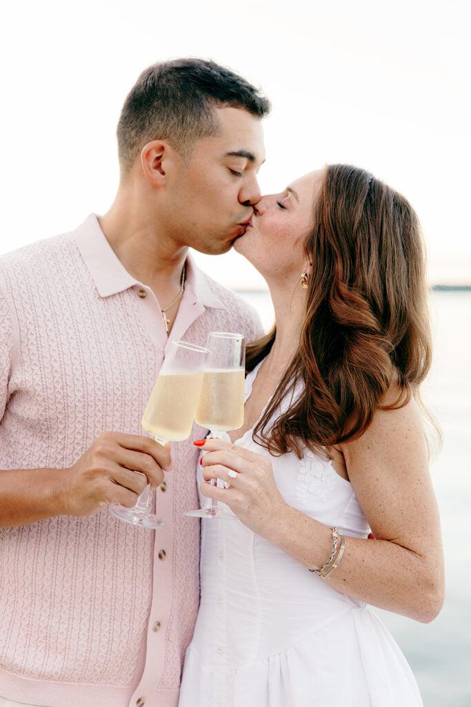 Couple standing together outdoors during a candid moment.
