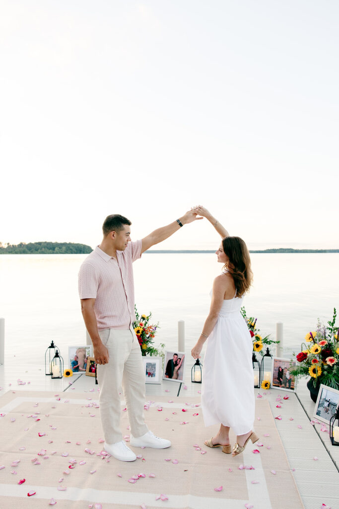 Natural light photo capturing a joyful engagement at crosslake chain.
