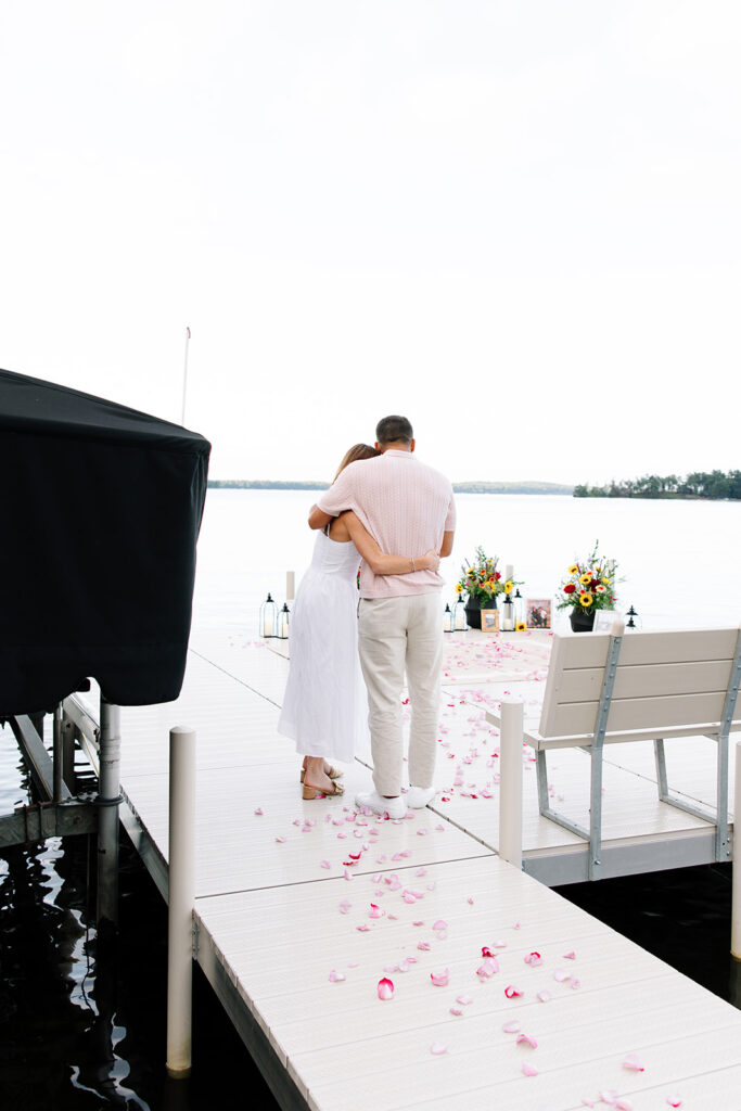 A romantic engagement proposal session at crosslake chain.
