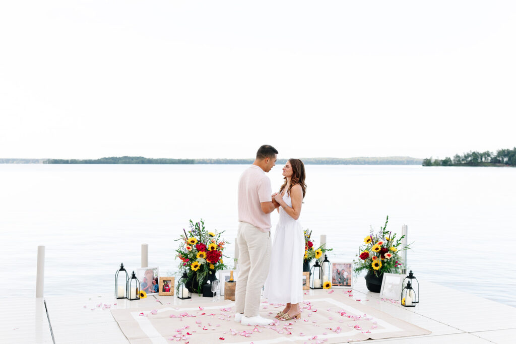 Couple standing together outdoors during a candid moment.

