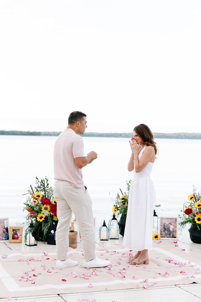 Natural light photo capturing a joyful engagement at crosslake chain.
