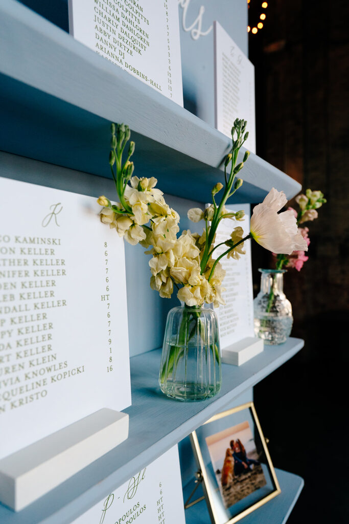 Elegant wedding ceremony setup inside The Northern Pacific Center with candles and florals
