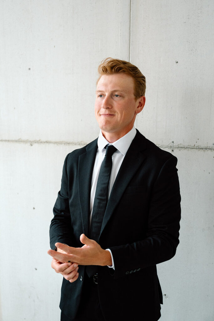 Bride and groom posing for timeless wedding portraits
