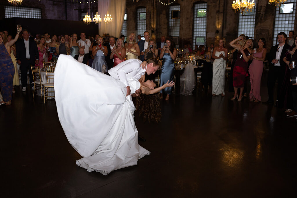 Guests dancing and celebrating during the lively wedding reception
