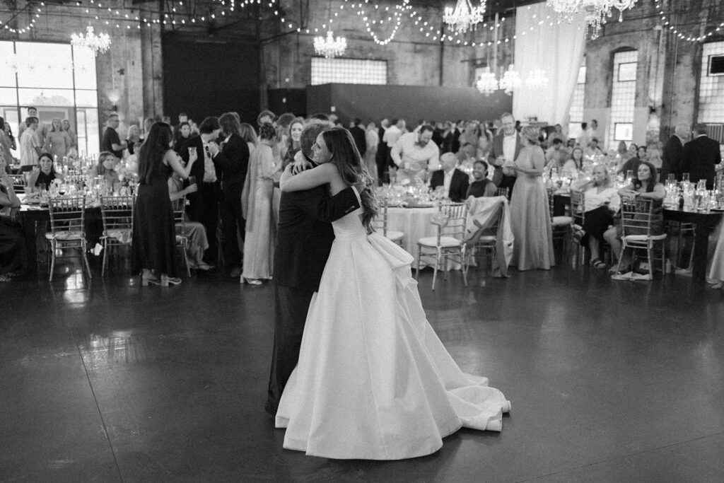 Guests dancing and celebrating during the lively wedding reception
